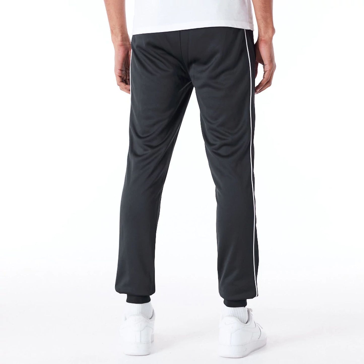 The Male model is wearing New York Yankees MLB Track Pant Black Fleece Track Joggers 5