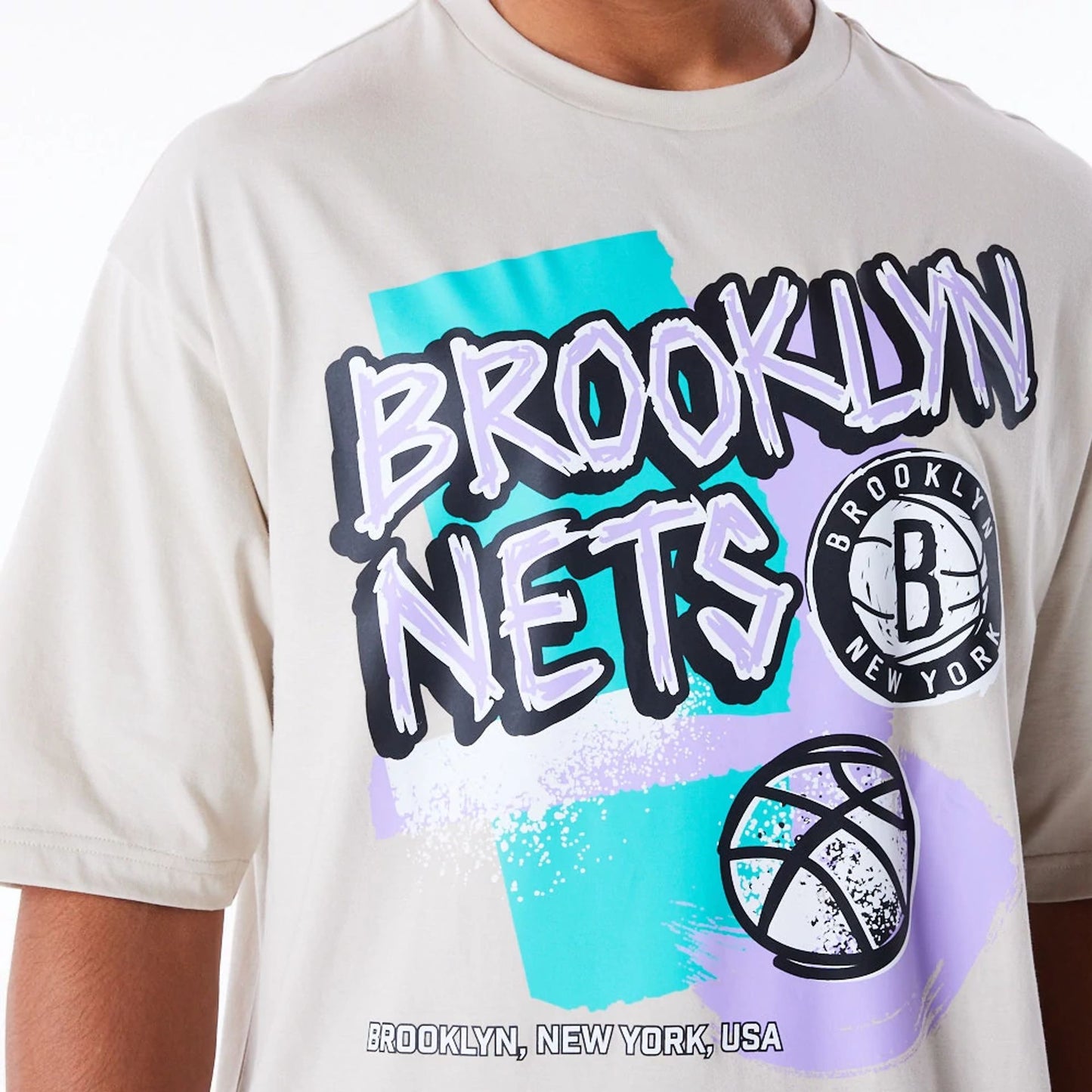 The Male model is wearing Brooklyn Nets Retro Graphic Stone Oversized T-Shirt 2