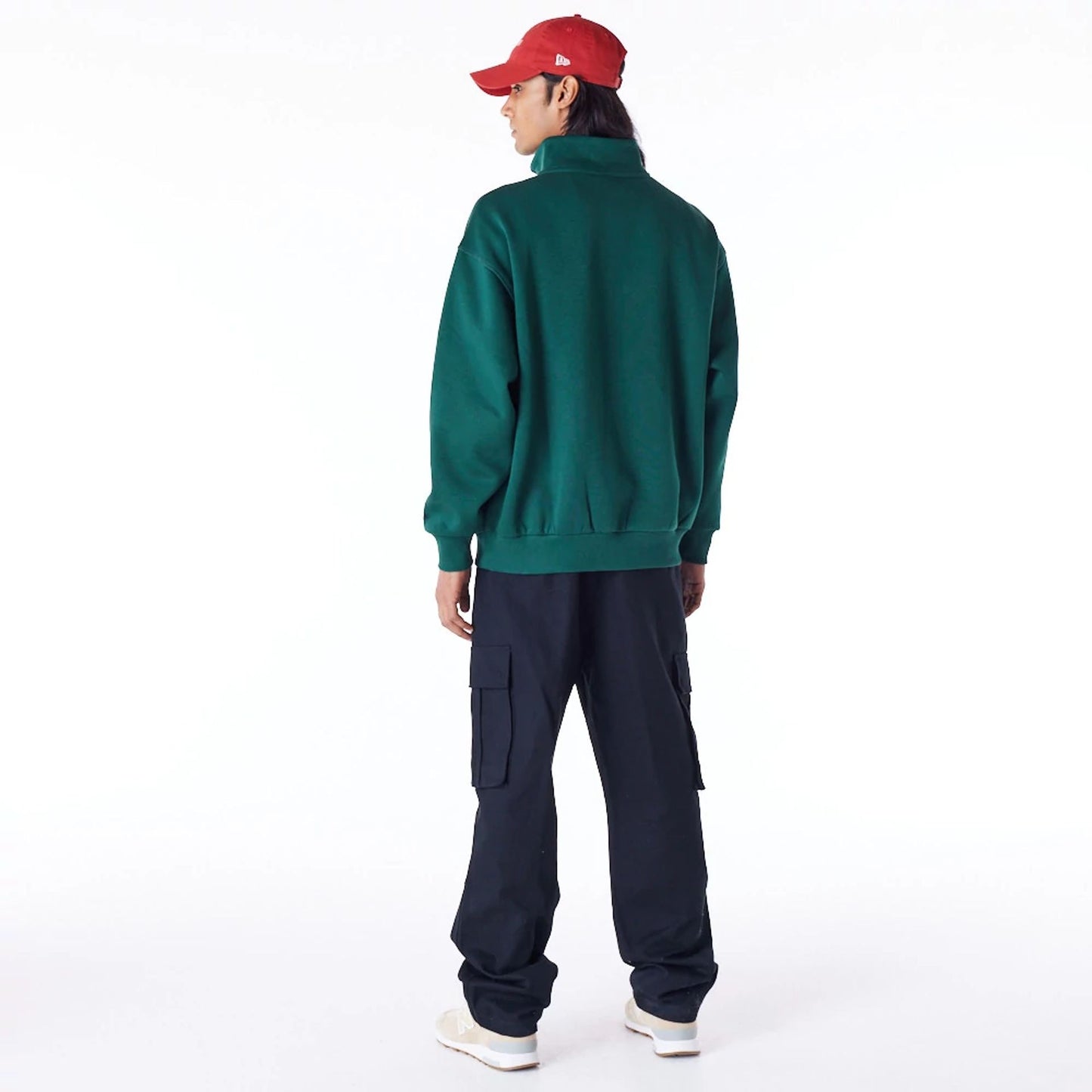 The Male model is wearing New Era Lifestyle Dark Green Quarter-Zip Sweater 12