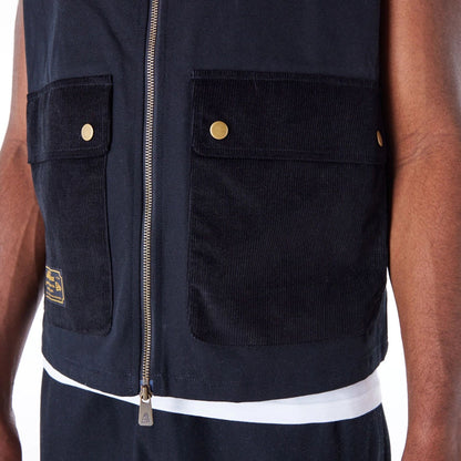 The Male model is wearing New Era Black Utility Vest Top 7