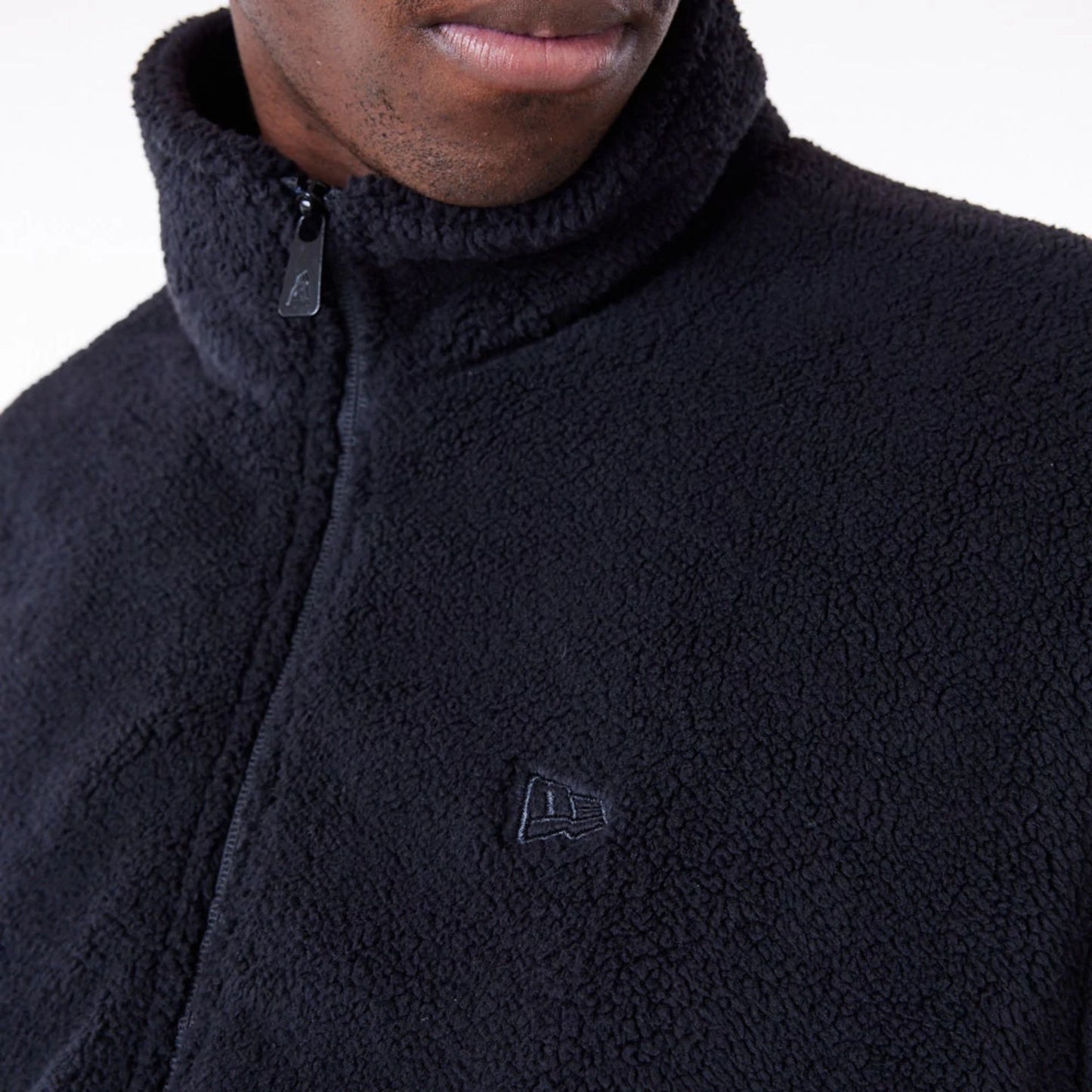 The Male model is wearing New Era Black Sherpa Jacket 3