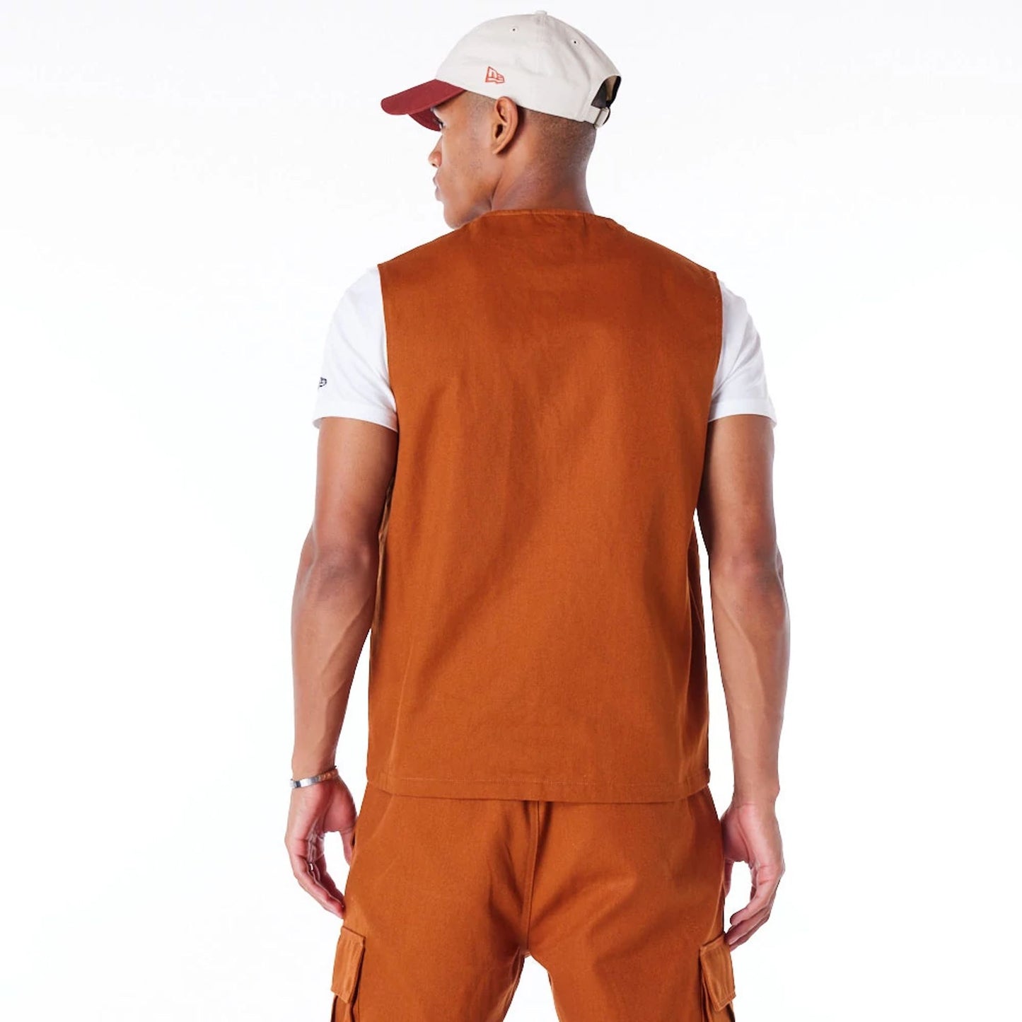 The Male model is wearing New Era Brown Utility Vest Top 8