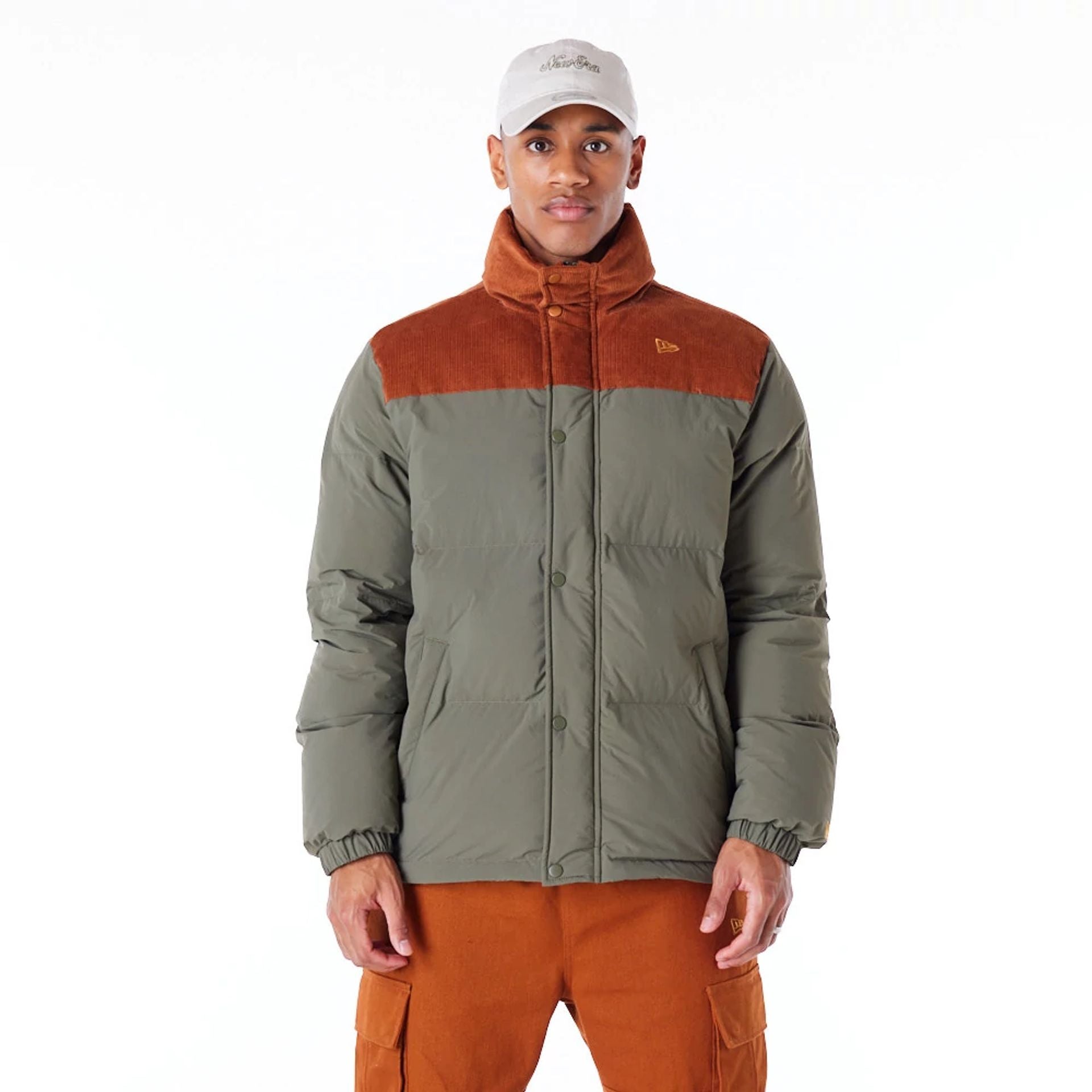 The Male model is wearing New Era Green Canvas Puffer Jacket 1