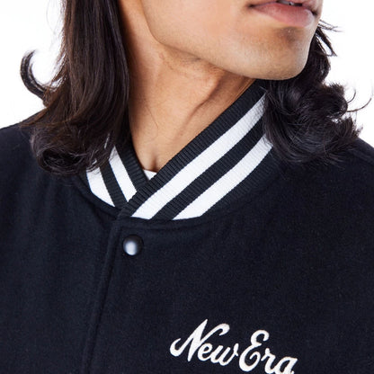 The Male model is wearing New Era Black Varsity Jacket 2