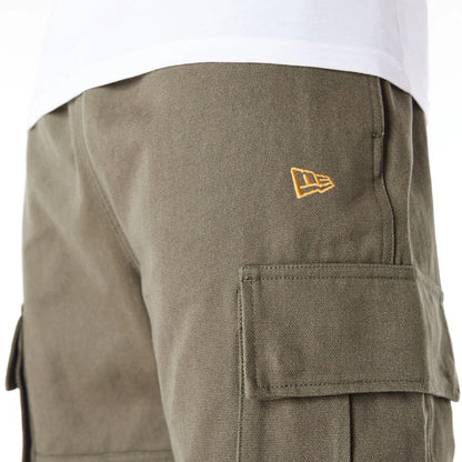 The Male model is wearing New Era Green Cargo Trousers 5