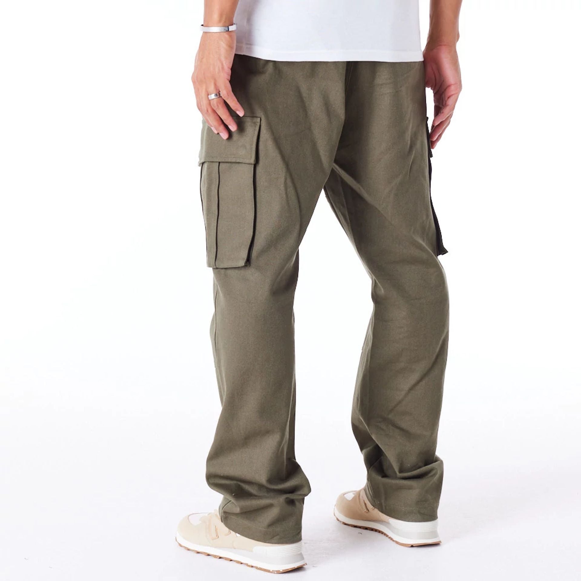 The Male model is wearing New Era Green Cargo Trousers 3