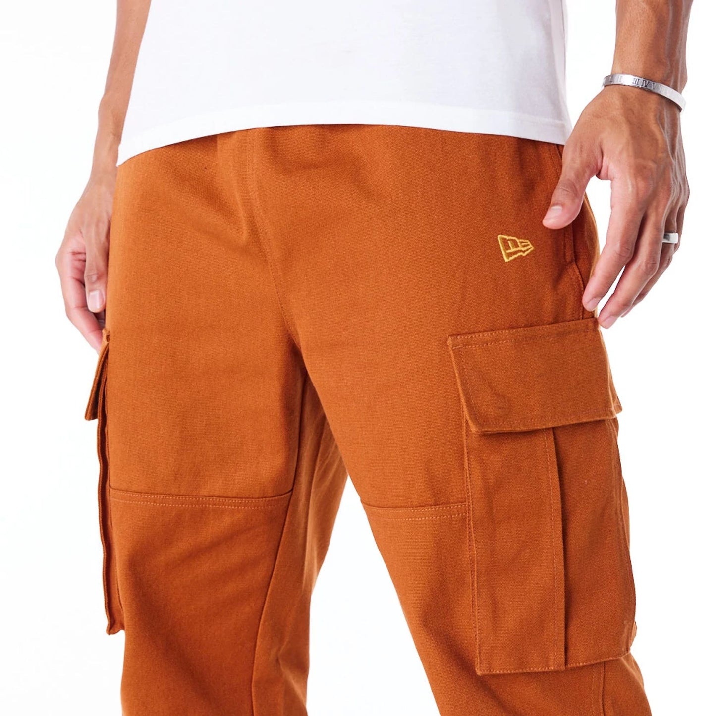 The Male model is wearing New Era Brown Cargo Trousers  8