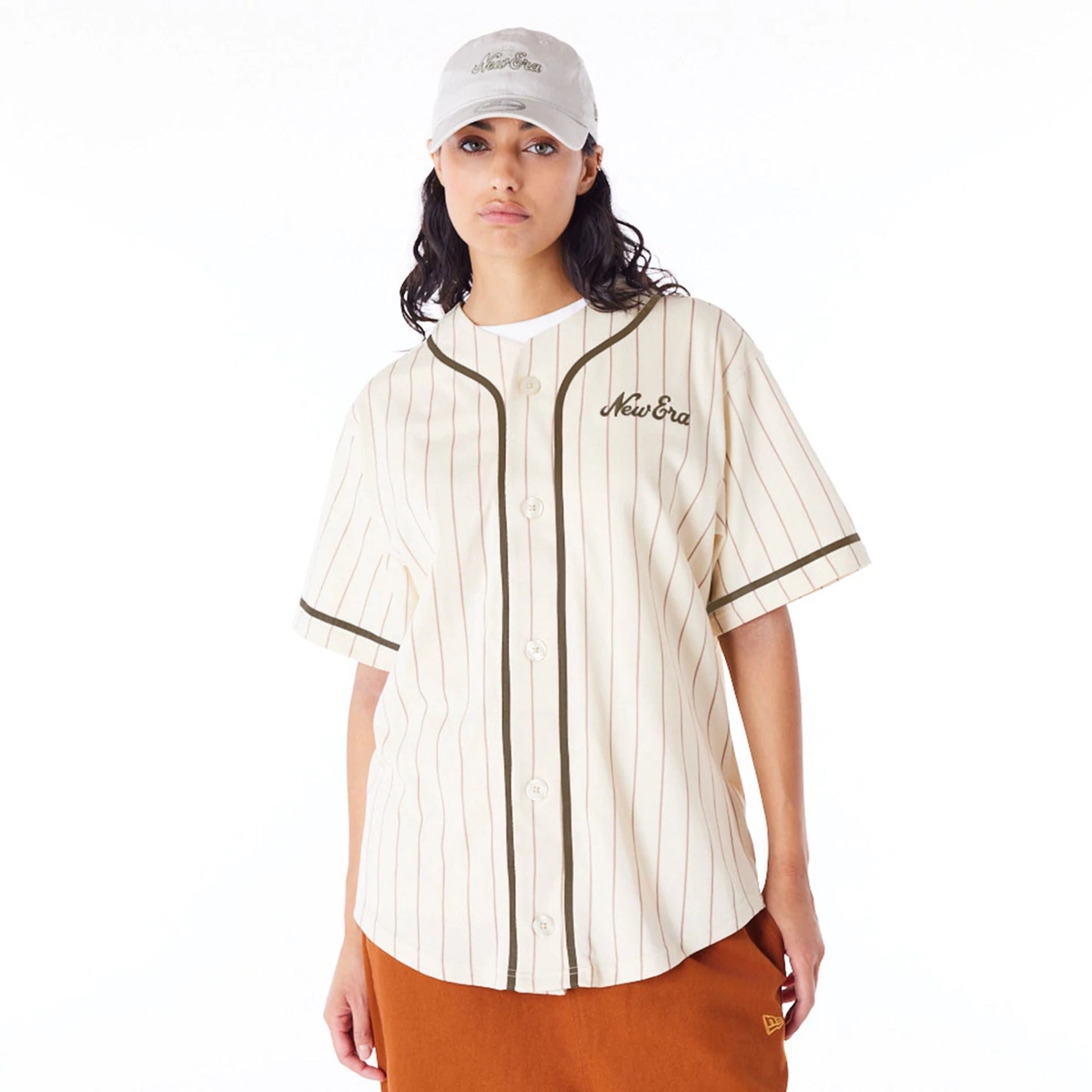 The Male model is wearing New Era Pinstripe Light Beige T-Shirt 3