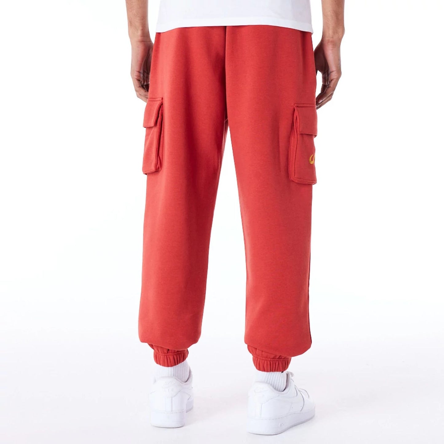 The Male model is wearing New Era Script Red Fleece Cargo Joggers 2