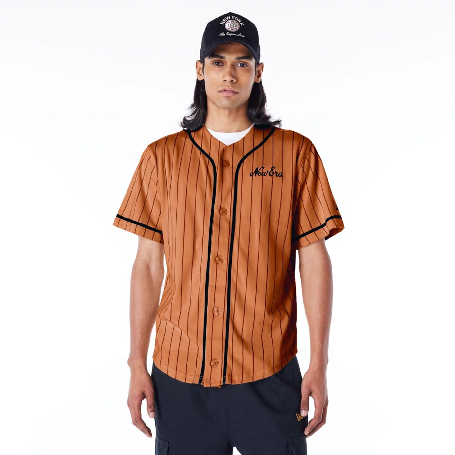 The Male model is wearing New Era Pinstripe Brown T-Shirt 1