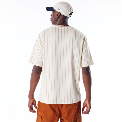 The Male model is wearing New Era Pinstripe Stone Oversized T-Shirt 5