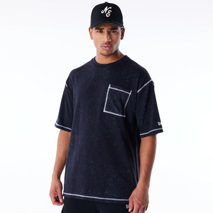 The Male model is wearing New Era Wash Black Oversized T-Shirt 1