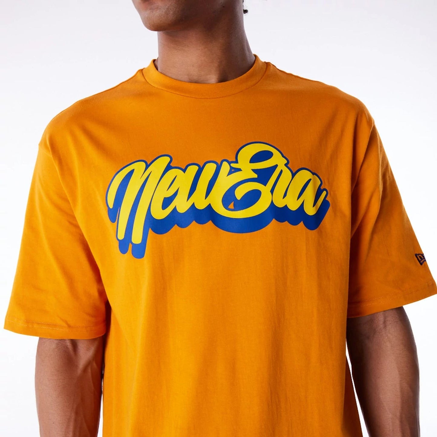 The Male model is wearing New Era Font Graphic Orange Oversized T-Shirt 3