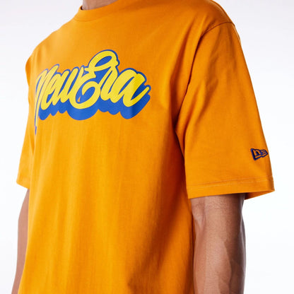 The Male model is wearing New Era Font Graphic Orange Oversized T-Shirt 4