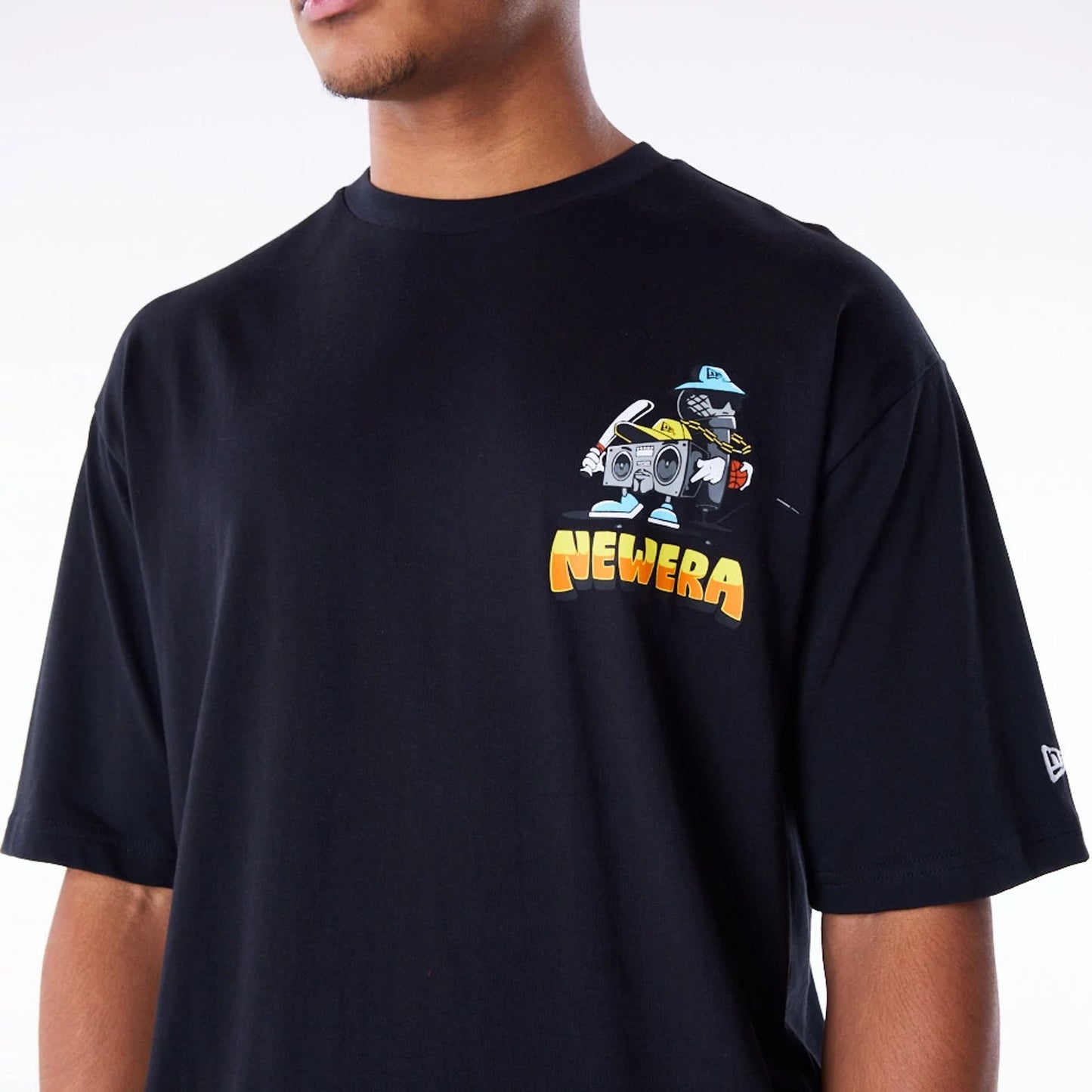 The Male model is wearing New Era Location Graphic New York Black Oversized T-Shirt 6