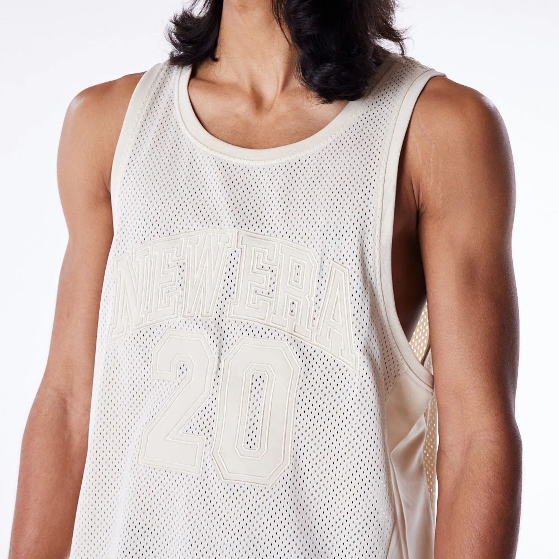 The Male model is wearing New Era Stone Mesh Tank Top 4