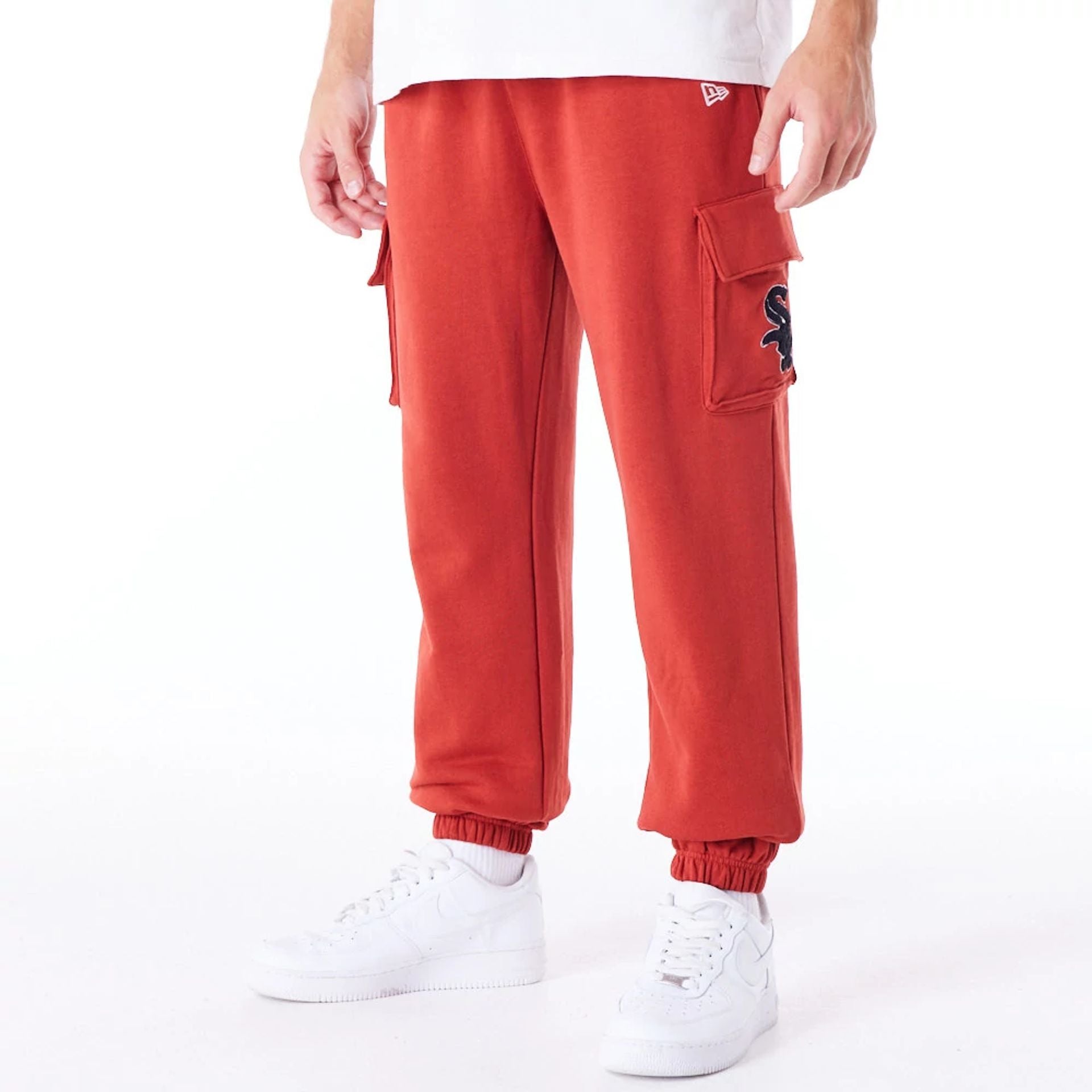 The Male model is wearing Chicago White Sox World Series Red Fleece Cargo Joggers 1