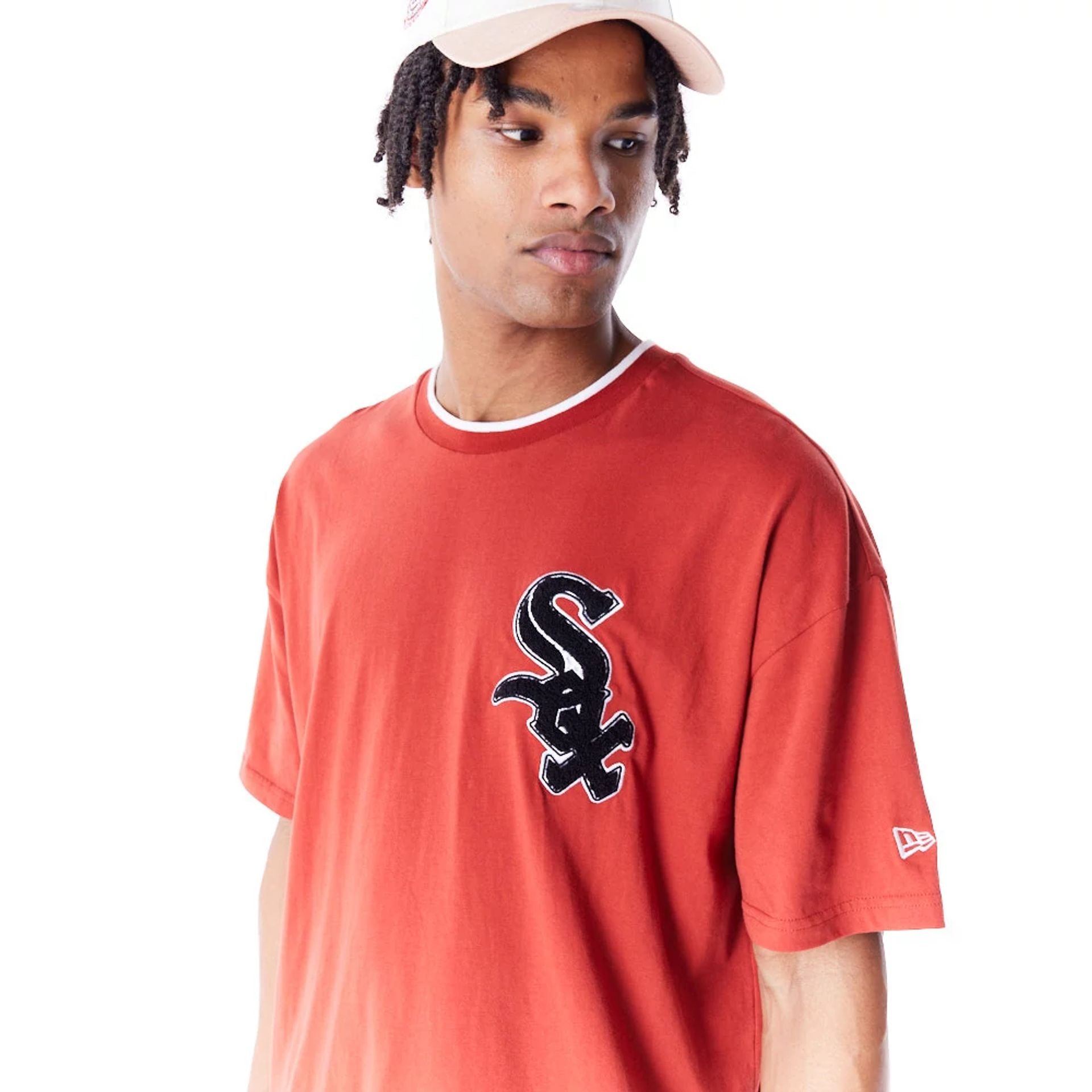 The Male model is wearing Chicago White Sox World Series Copper Drop Shoulder T-Shirt  2