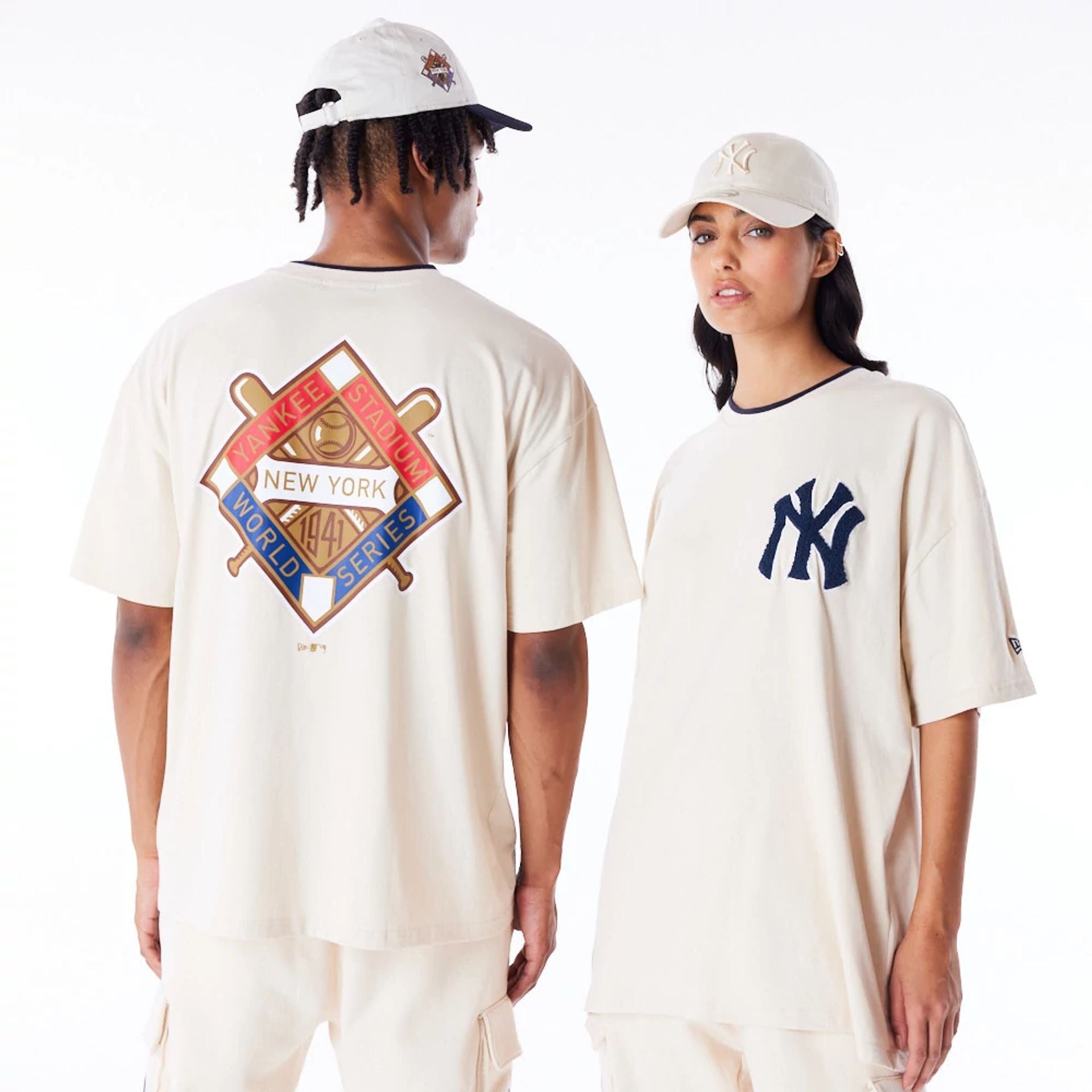 The Male model is wearing New York Yankees World Series Light Beige Drop Shoulder T-Shirt  1