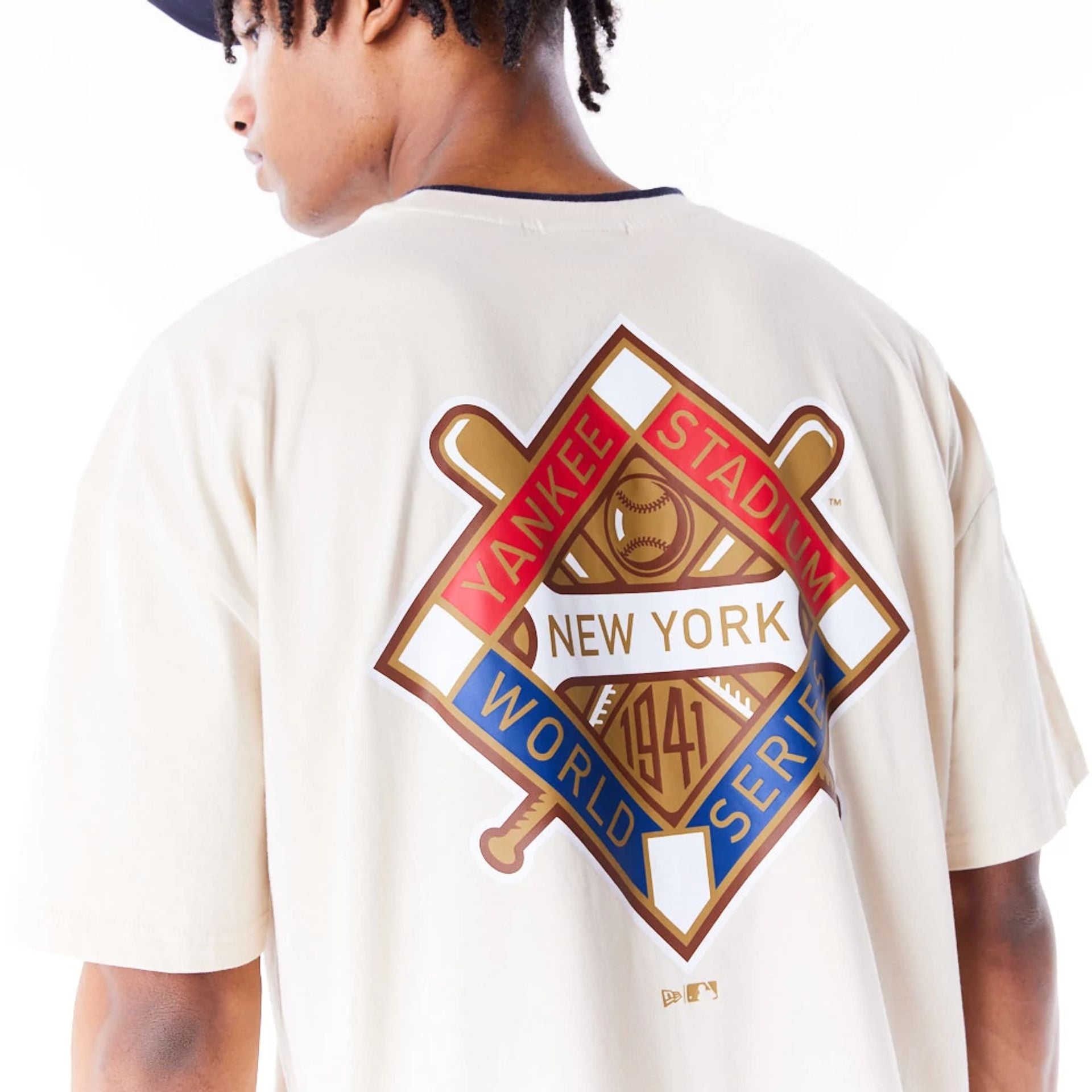 The Male model is wearing New York Yankees World Series Light Beige Drop Shoulder T-Shirt  9