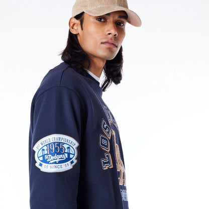 The Male model is wearing LA Dodgers World Series Navy Oversized Fleece Top  5