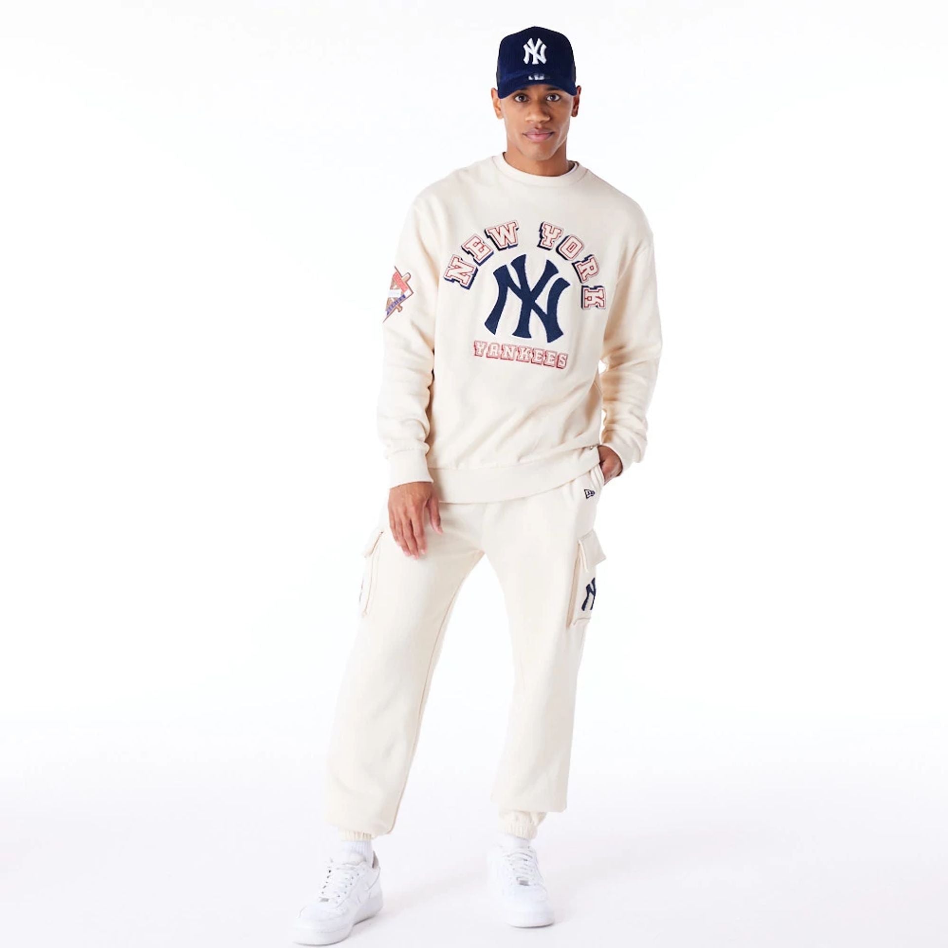 The Male model is wearing New York Yankees World Series Light Beige Oversized Fleece Top  2