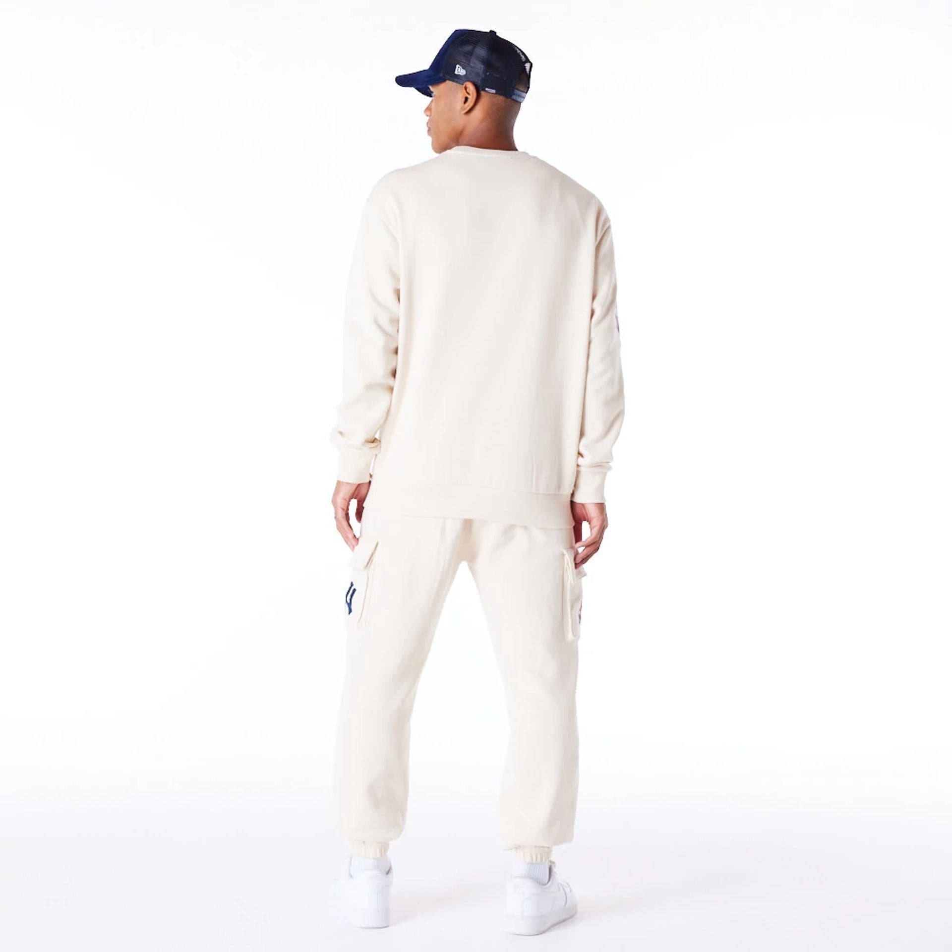 The Male model is wearing New York Yankees World Series Light Beige Oversized Fleece Top  3