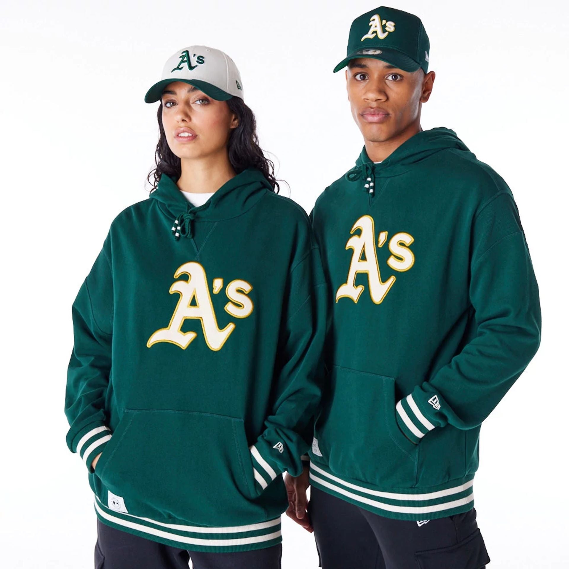 The Male model is wearing Oakland Athletics MLB Rib Infill Dark Green Oversized Pullover Hoodie 1