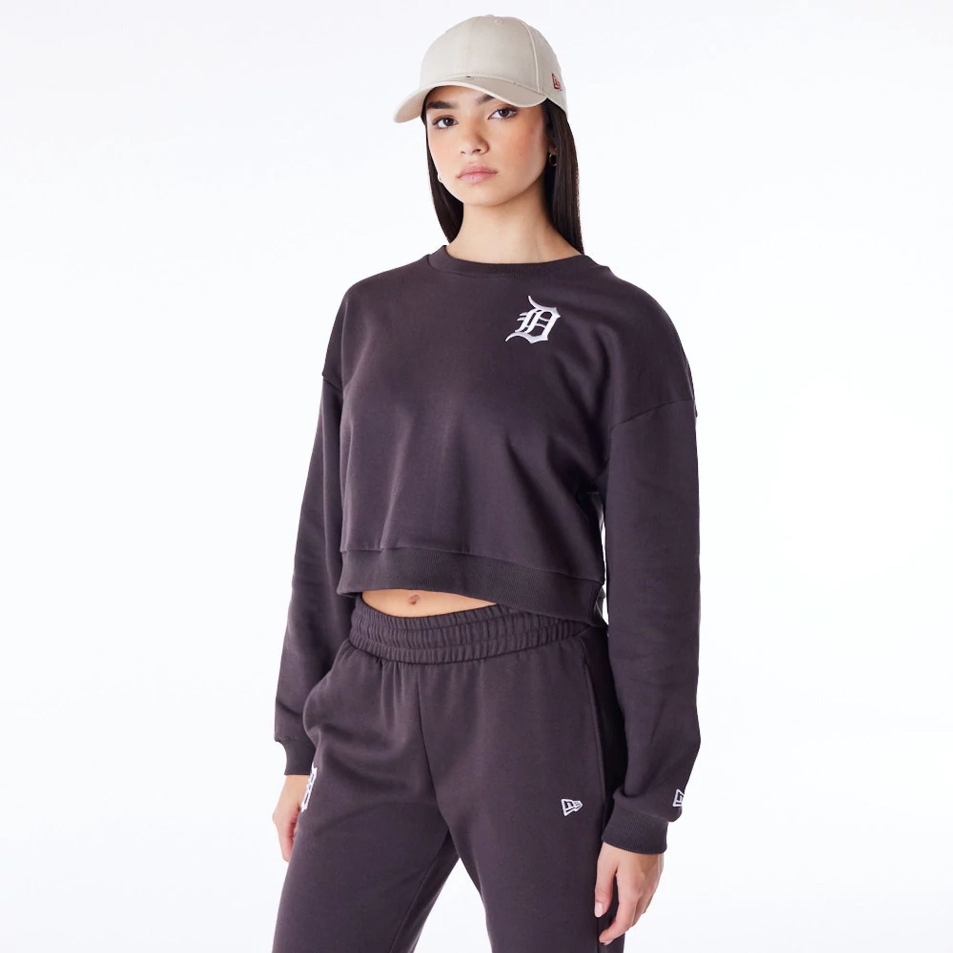 The Female model is wearing Detroit Tigers Womens MLB League Essential Dark Brown Crop Crew Neck Sweatshirt 1