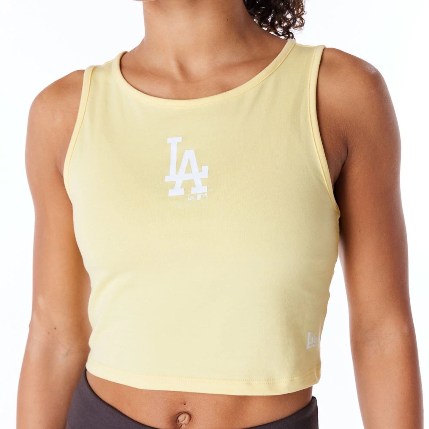 The Female model is wearing LA Dodgers Womens MLB League Essential Pastel Yellow Crop Tank Top 5