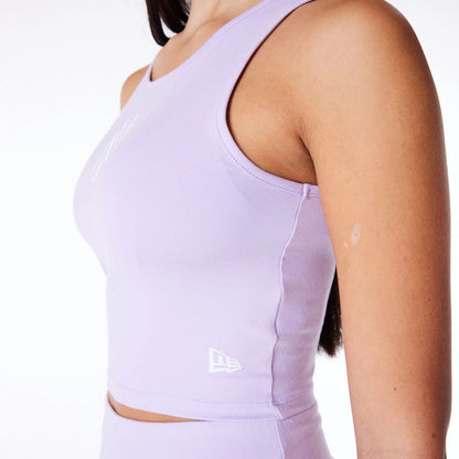 The Female model is wearing New York Yankees Womens MLB League Essential Pastel Purple Crop Tank Top 8