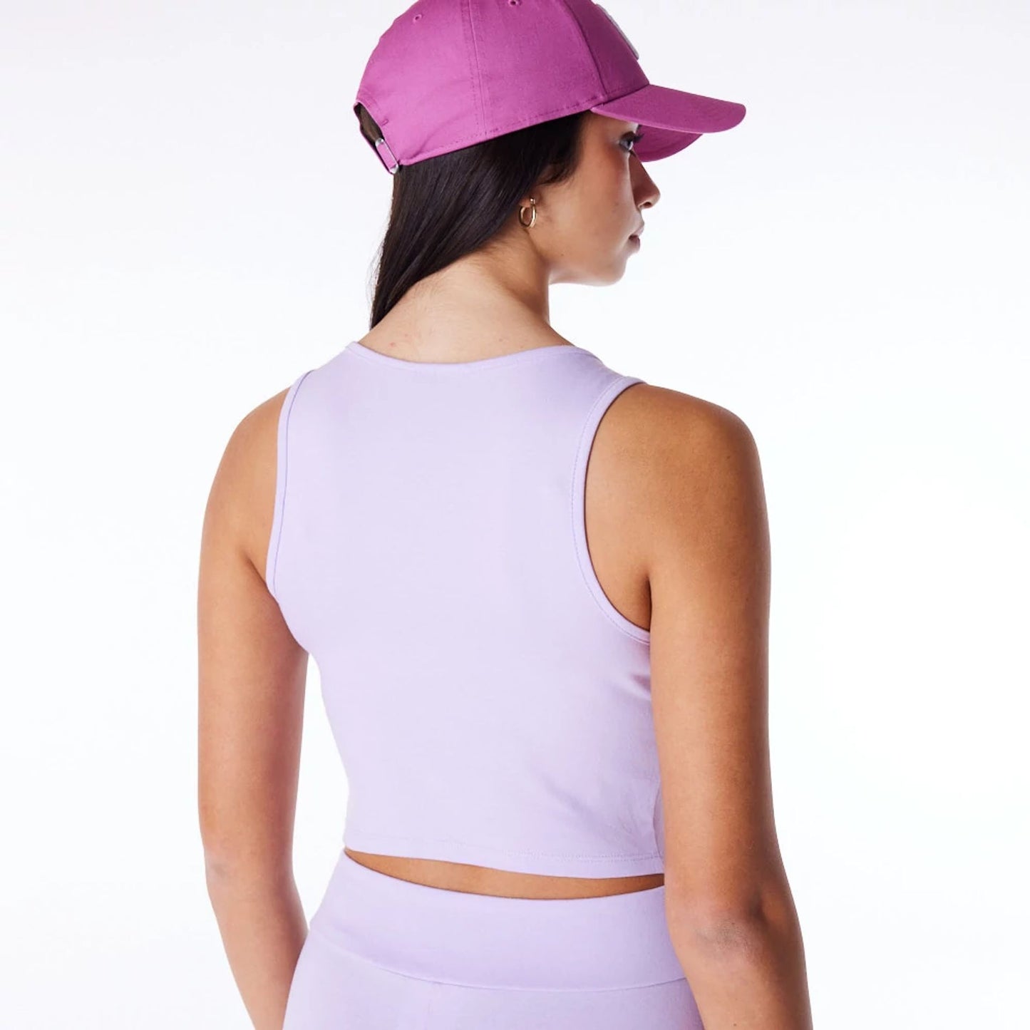 The Female model is wearing New York Yankees Womens MLB League Essential Pastel Purple Crop Tank Top 5