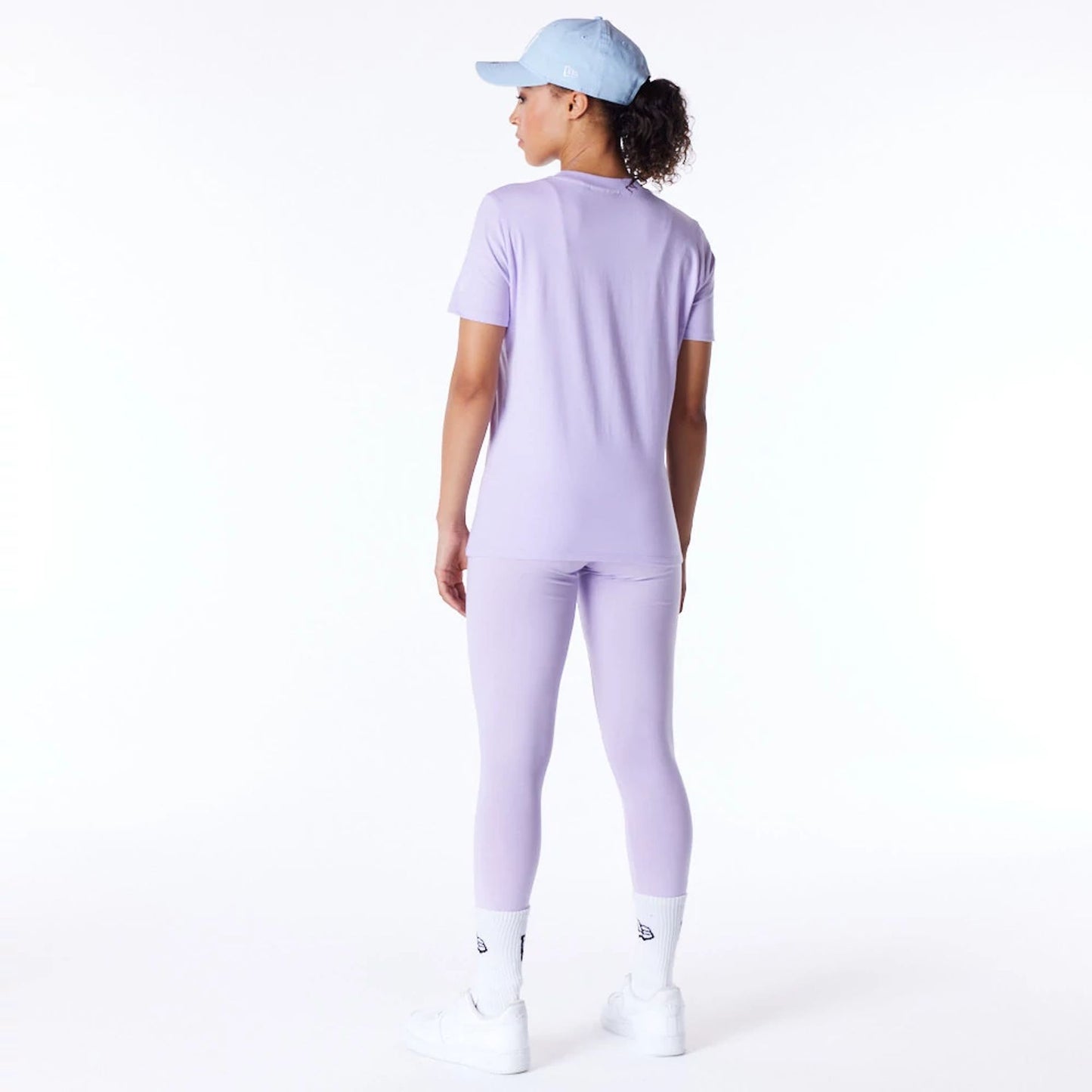 The Female model is wearing New York Yankees Womens MLB League Essential Pastel Purple T-Shirt 3