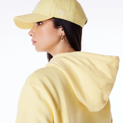 The Female model is wearing LA Dodgers Womens MLB League Essential Pastel Yellow Pullover Hoodie 4