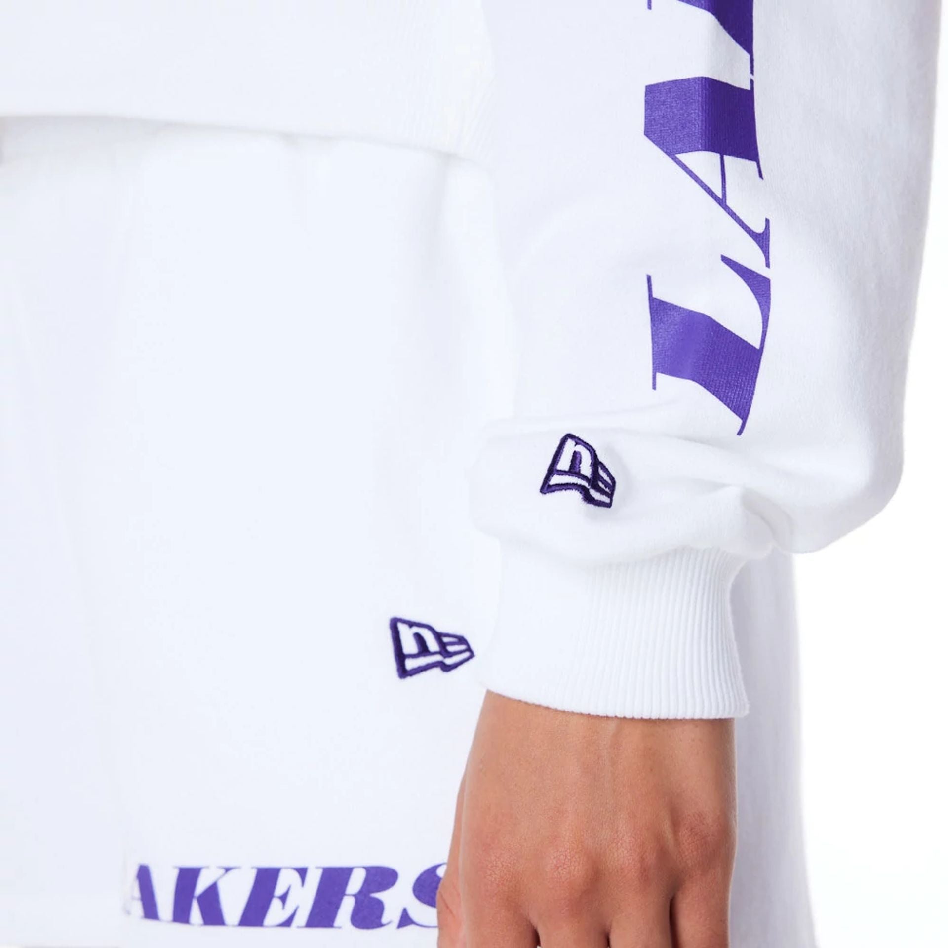 The Female model is wearing LA Lakers Womens NBA Wordmark White Crop Crew Neck Sweatshirt 8