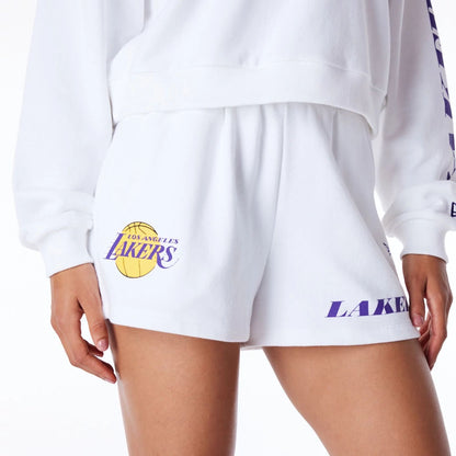 The Female model is wearing LA Lakers Womens NBA Wordmark White Shorts 8