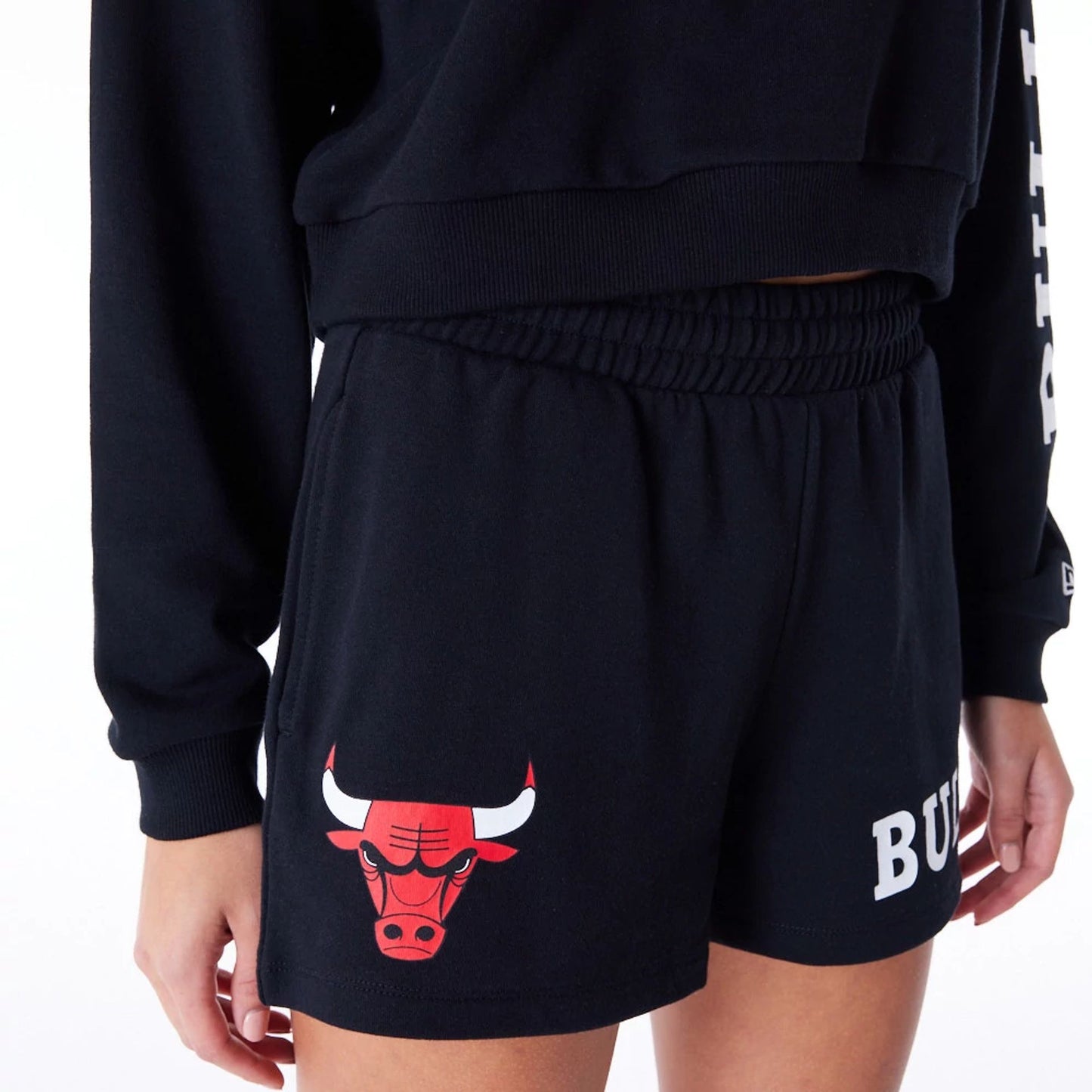 The Female model is wearing Chicago Bulls Womens NBA Wordmark Black Shorts 8