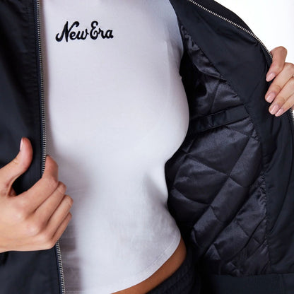 The Female model is wearing New Era Womens Black Bomber Jacket 3