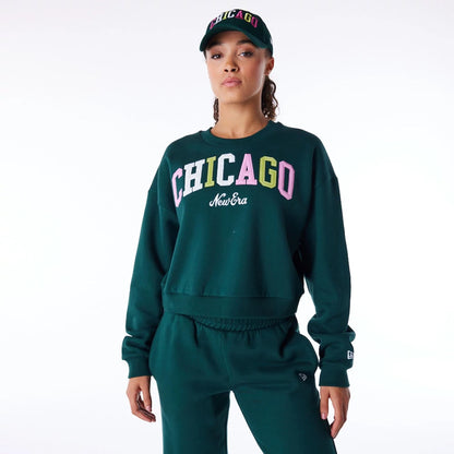 The Female model is wearing New Era Infill Dark Green Crop Crew Neck Sweatshirt 1