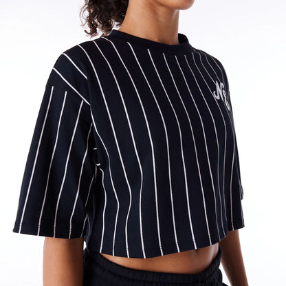 The Female model is wearing New Era Womens Pinstripe Black Crop T-Shirt 4