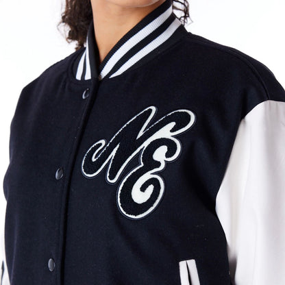 The Female model is wearing New Era Womens Black Varsity Jacket 3