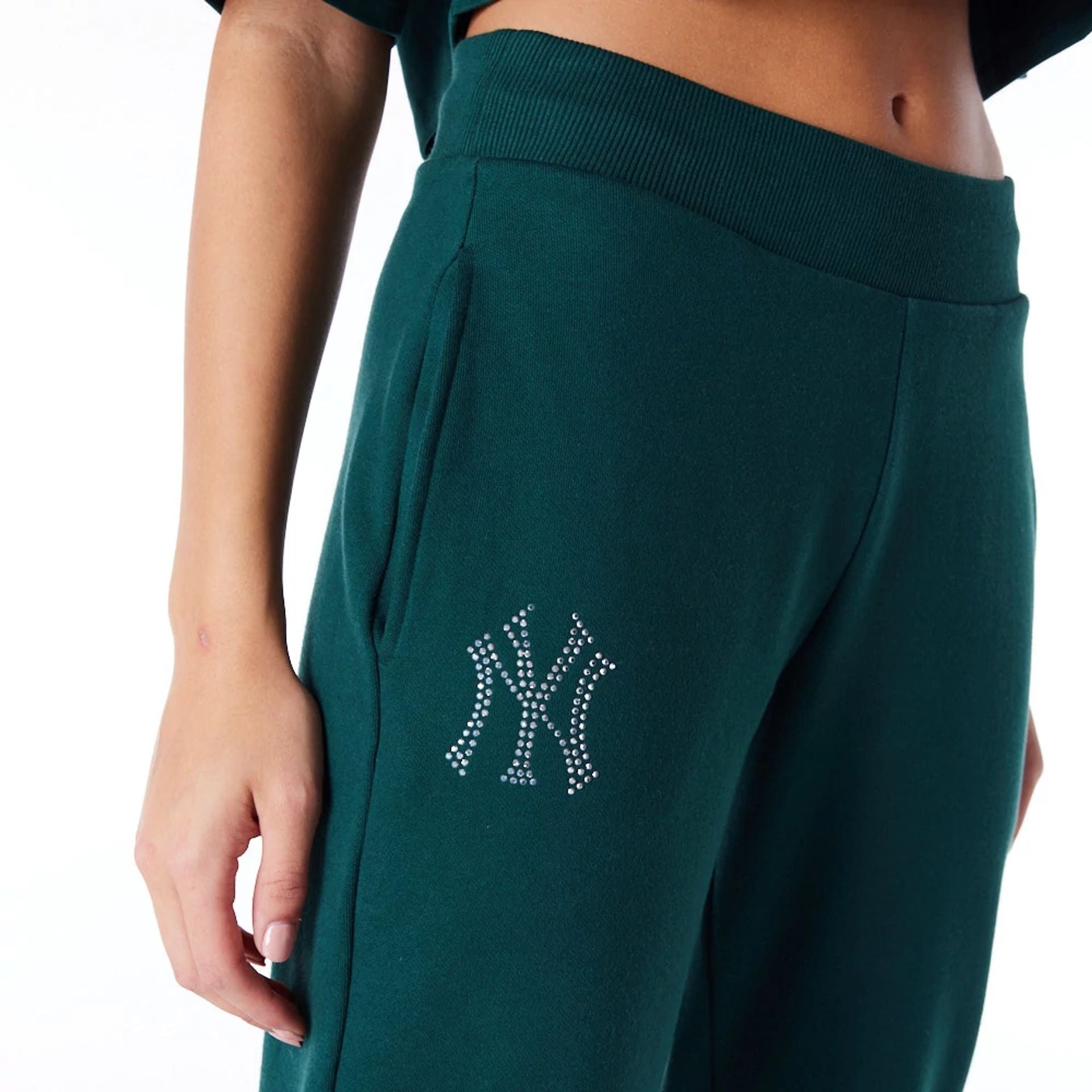 The Female model is wearing New York Yankees Womens MLB Diamante Dark Green Fleece Joggers 2