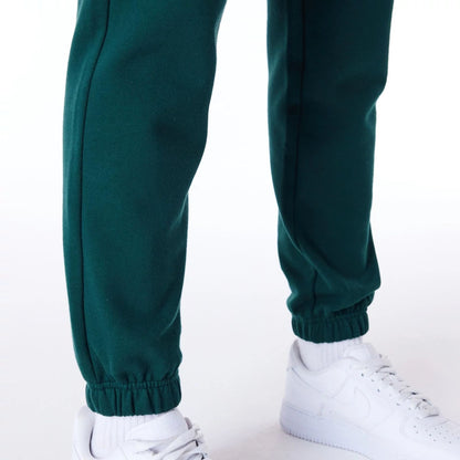 The Female model is wearing New York Yankees Womens MLB Diamante Dark Green Fleece Joggers 4