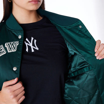 The Female model is wearing New York Yankees Womens MLB Dark Green Bomber Jacket 4