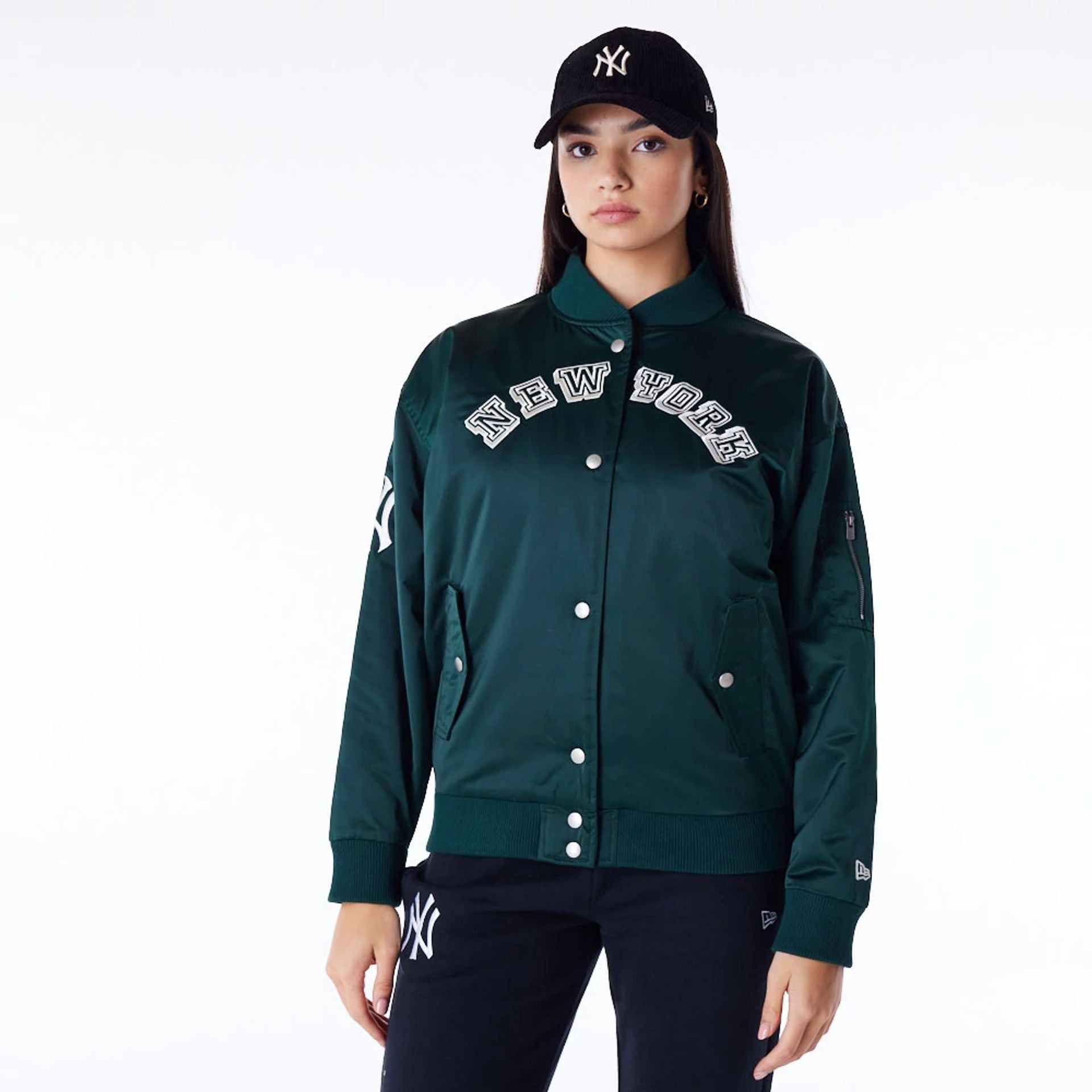 The Female model is wearing New York Yankees Womens MLB Dark Green Bomber Jacket 1