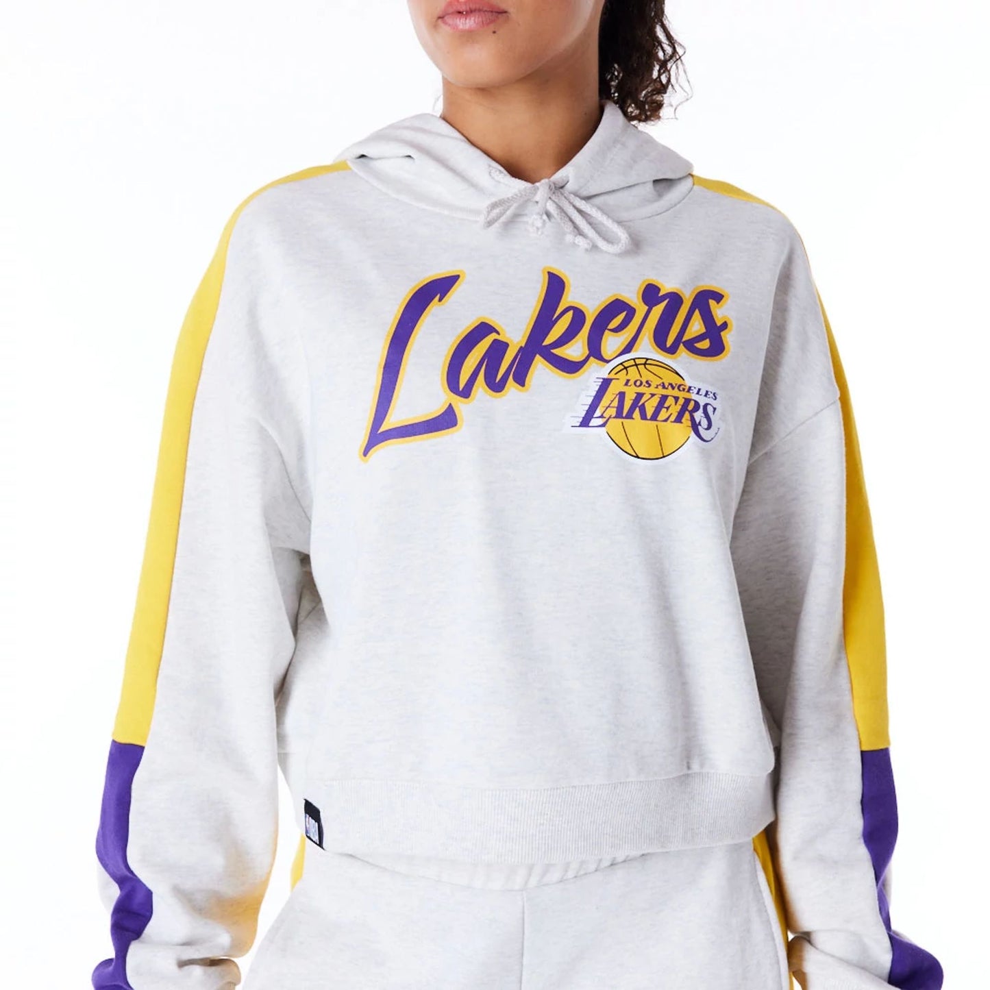 The Female model is wearing LA Lakers Womens NBA Colour Block Grey Pullover Hoodie 8