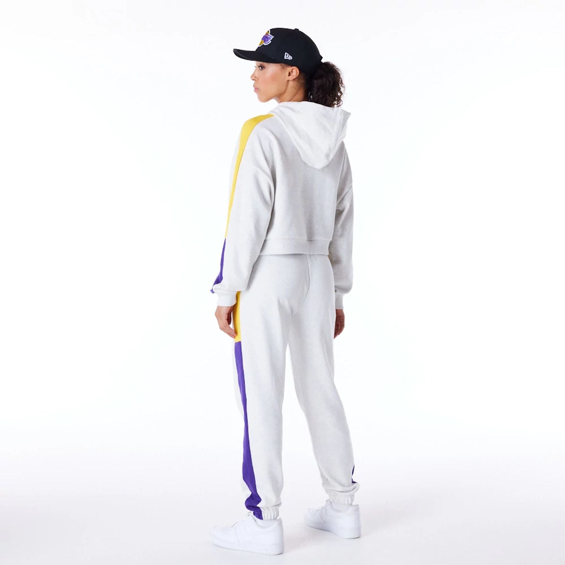 The Female model is wearing LA Lakers Womens NBA Colour Block Grey Pullover Hoodie 5