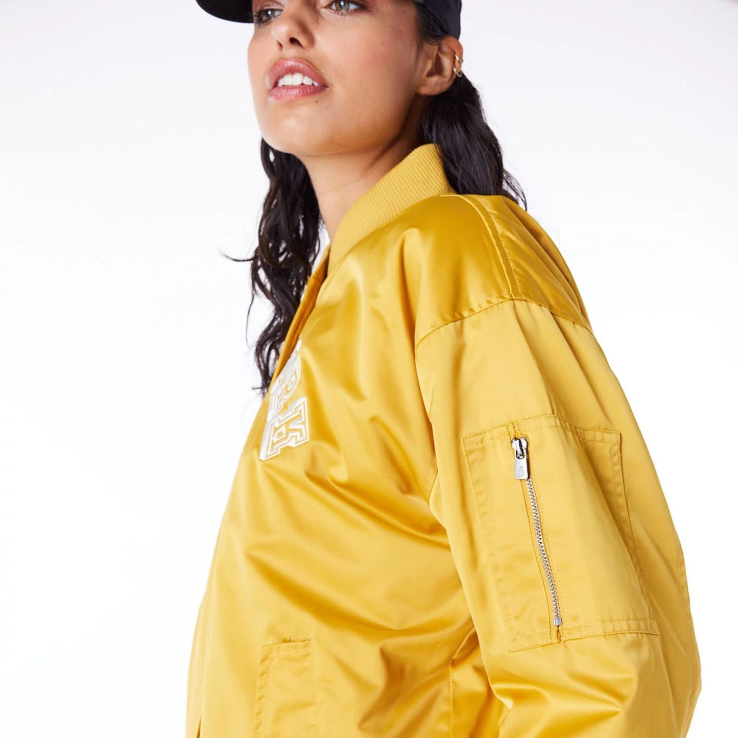 The Female model is wearing New York Yankees Womens MLB Dark Yellow Bomber Jacket 5