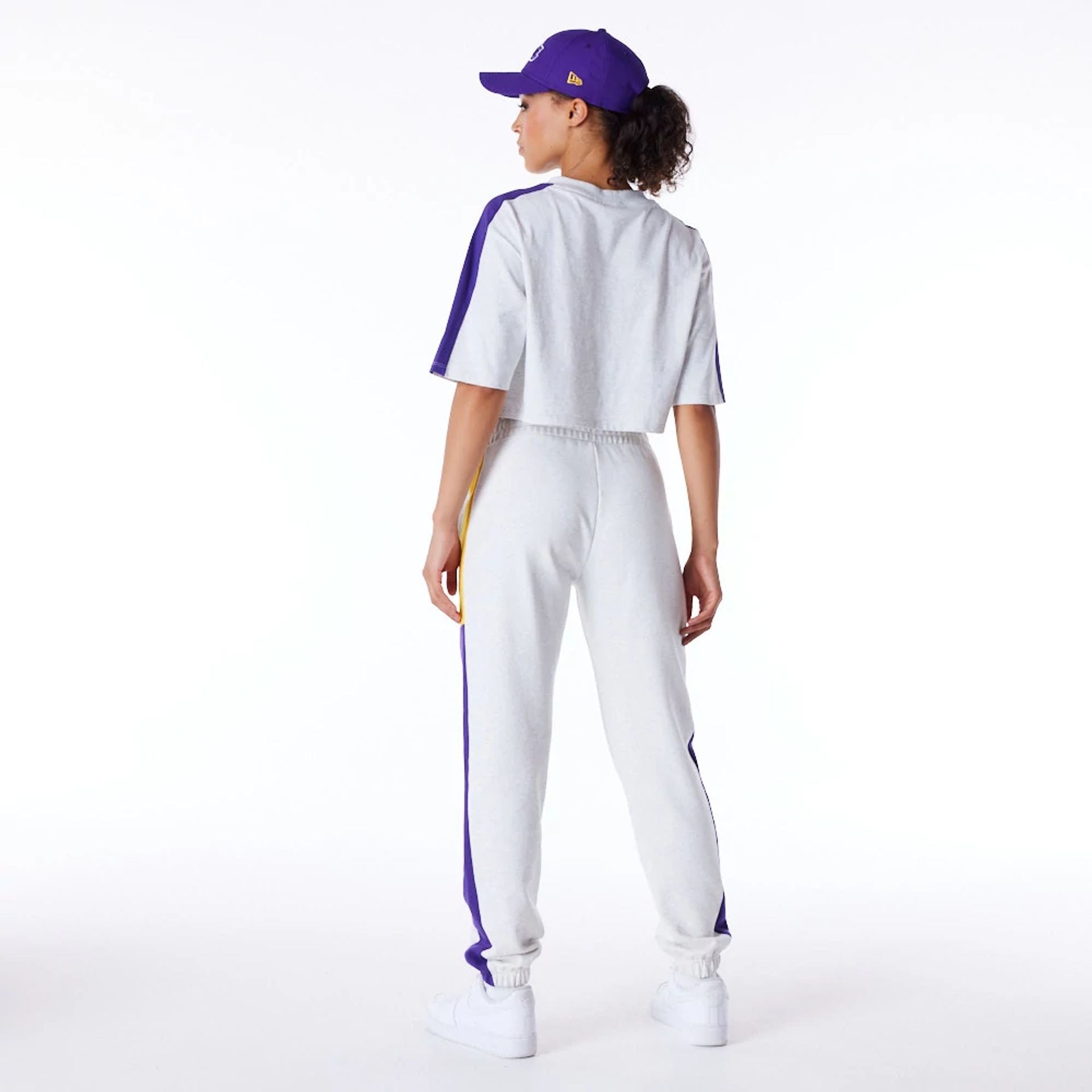 The Female model is wearing LA Lakers Womens NBA Colour Block Grey Fleece Joggers 4