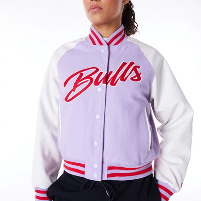 The Female model is wearing Chicago Bulls Womens NBA Pastel Purple Varsity Jacket 5